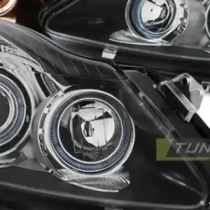 Faruri OPEL CORSA D 04.06-11 cu Angel Eyes pe fundal negru Ieftin